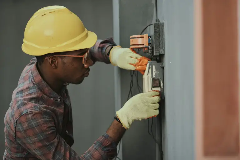 Licensed electrician completing residential electrical work